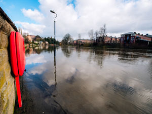 Supporting image for story: River bursts its banks in Shrewsbury - with flood alerts around county