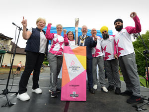 Supporting image for story: Baton-bearers young and old fly the flag as Queen's Relay hits the Black Country