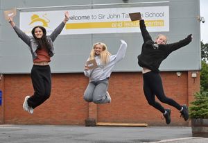 Kayleigh Bennett, Amelia Powell and Lucy Wainwright, all 16, celebrating their results at the Sir John Talbot School in Whitchurch