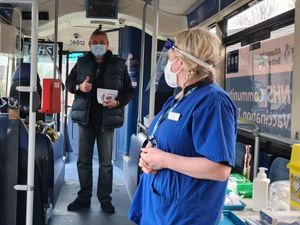 Supporting image for story: Bus converted into mobile vaccination centre