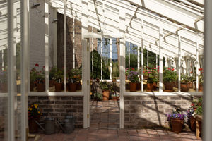 The historic Kitchen Walled Garden greenhouse at Benthall Hall has been recreated by White Cottage Greenhouses.