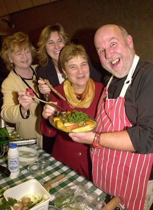 "The Cooking Canon" Rev John Eley serves up some heavenly food for (from left) Audrey Kelsall, chairman of Staffordshire WI Markets Society, Alison Perks, WI Markets member and Shirley Husselbee, secretary, at the society's Annual Markets Day at Stafford County Showground