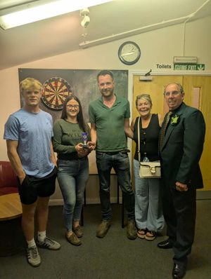 The darts winners Molly and Tom were presented with the Margaret Jones Cup by Ashley Jones, here with Marie Jones and President Martin Udall