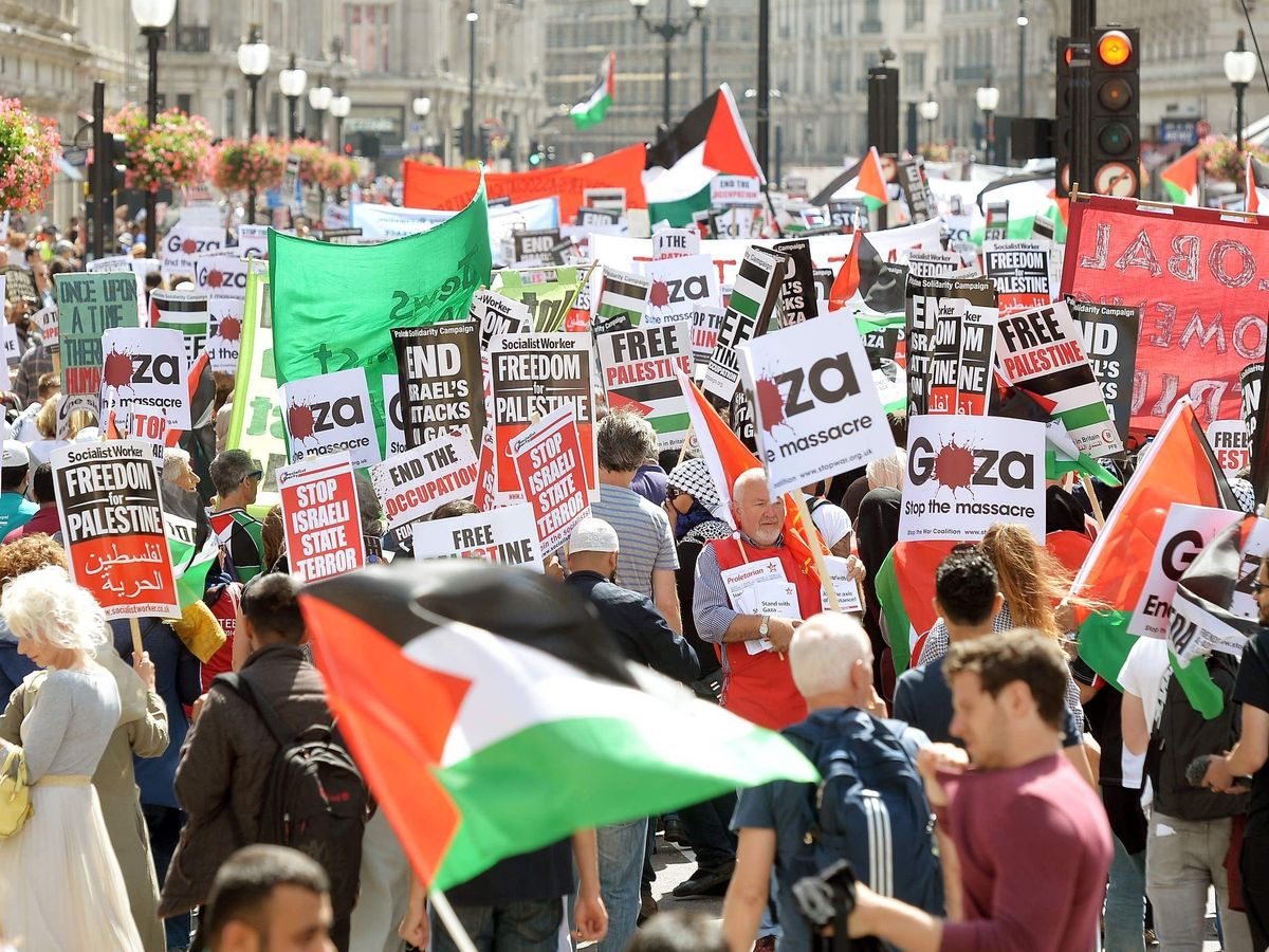 Police question woman who wore ‘concentration camp prisoner’ outfit at protest