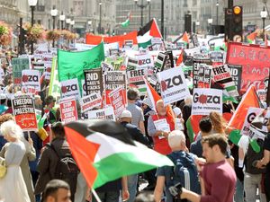 Supporting image for story: Police question woman who wore ‘concentration camp prisoner’ outfit at protest