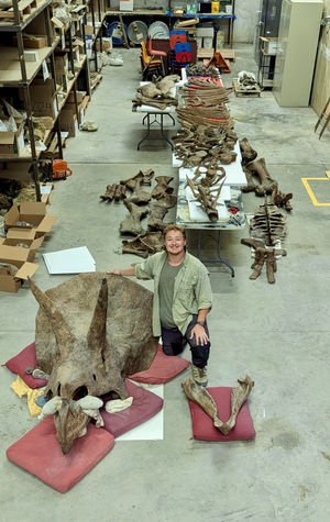 Tom, with a triceratops