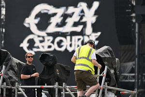 Technicians prepare equipment on the eve of British rock band Black Sabbath's "Back to The Beginning" concert, Ozzy Osbourne's final ever gig as Black Sabbath's frontman at Villa Park in Birmingham, central England on July 4, 2025. Osbourne, who revealed in 2020 that he has Parkinson's disease, will join Tony Iommi, Geezer Butler and Bill Ward for the all-day "Back To The Beginning" show in Birmingham, central England, where the heavy metal giants formed in 1968. (Photo by ANDY BUCHANAN / AFP) (Photo by ANDY BUCHANAN/AFP via Getty Images)          