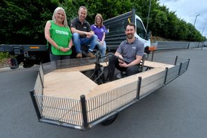 Team Zaun Group from Wolverhampton with what will be a basketball court. From the team is Ben Barnes and Adam Christie, and with them is Kate Thomas from Macmillan and Sam Belcher from Krazy Races