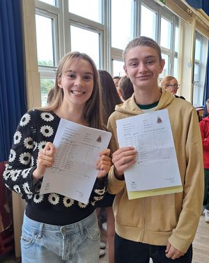 Arabella Sutton Dunn and Patrick Caufield celebrating their achievements