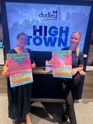 Bridgnorth Hub staff with their Bridgnorth Music & Arts Festival 2025 Posters