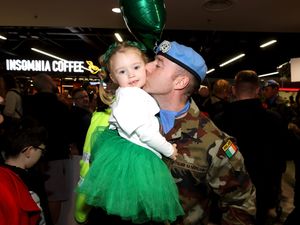 Supporting image for story: Cheers and emotional reunions as Irish peacekeepers touch down on home soil