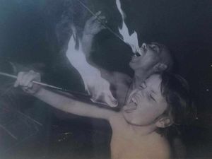 Anthony learning to breathe fire from his father as a child