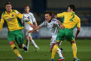 Sean Cooke of AFC Telford United and Danny Fearnehough of Vauxhall Motors.