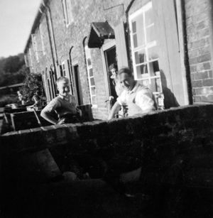 Billy and Gertie Millward at Carpenters Row in 1952 with son Ted.