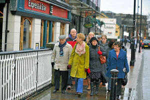 Families walking into a meeting with Robert Francis the inquiry chairman