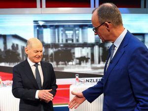 Olaf Scholz, German Chancellor of the Social Democratic Party, left, and Friedrich Merz, leader of the Christian Democratic Union, ahead of a debate in Berlin in February