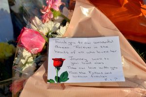 Heartfelt messages were left on the flowers outside