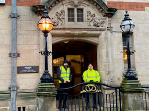 Security guards posted at the main entrance to County Buildings in Stafford. Photo by Phil Corrigan. Free for all LDRS partners to use.