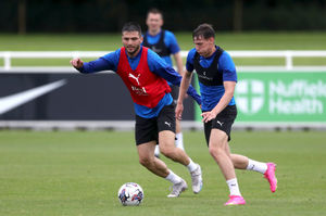 Okay Yokuslu keeps a close eye on Taylor Gardner-Hickman (Photo by Adam Fradgley/West Bromwich Albion FC via Getty Images).