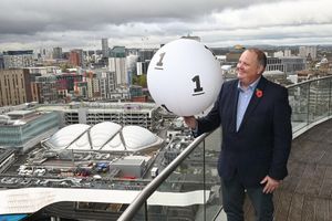 Andy Carter, senior winners' adviser to the National Lottery, surveys Britain's luckiest postal area from the terrace of the Rotunda