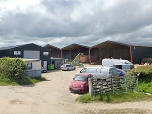 Supporting image for story: Decision due on farm's renewed log cabin business application