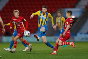 Josh Vela of Shrewsbury Town and Matthew Smith of Doncaster Rovers. (AMA)