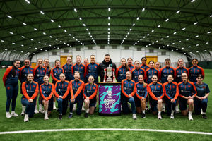 Wolves Women first team pose with the trophy (Photo by Jack Thomas - WWFC/Wolves via Getty Images)