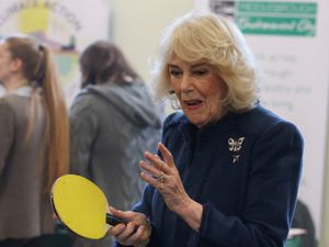 Supporting image for story: Queen takes part in table tennis match on community centre visit
