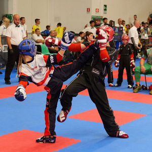 Nine-year-old Belle Greer, from Madeley in Telford, in kickboxing action on her way to two European medals.