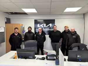 Brindley Kia servicing team inside service reception.