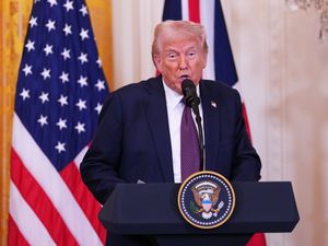 US President Donald Trump during a joint press conference with Prime Minister Sir Keir Starmer with the US and UK flags in the background