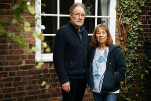 A couple from Meole Brace in Shrewsbury are devastated as their home has been wrecked by foam insulation from rouge traders. In Picture: Sue and David.