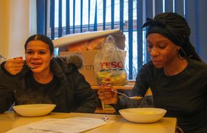 Pupils and parents who attended the workshop enjoying the food they created