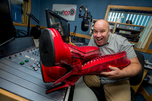 Dicky Dodd and the team at Signal 107 with the famous boots