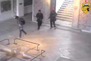 This frame grab from a video released by Tunisia's Interior Ministry shows the gunmen walking through the National Bardo museum during the attack