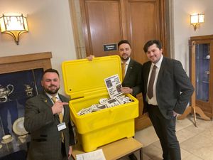(l-r) Lib Dem councillors Andrew Tromans, Ethan Stafford and Ryan Priest presented a grit bin full of leaflets at Dudley Council calling for removed bins to be put back. Picture Martyn Smith LDRS free for LDRS use