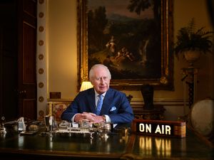 The King sat at his desk in Buckingham Palace recording The King's Music Room for Apple Music