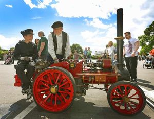 Frank Kennedy and grandson Joshua, aged 11, with Frank's Garrett Traction Engine