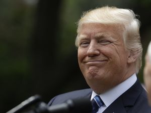 Supporting image for story: This woman's photoshop trick on Donald Trump will leave you scratching your head