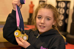 Abbey Hargreaves with her medals.