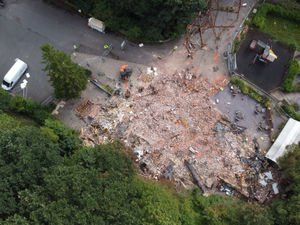 Supporting image for story: Drone images show devastating remains of The Crooked House as campaigners hold overnight watch to protect site