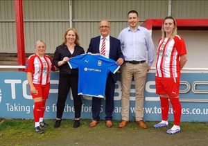 Brendan Wall, fourth from left, with April Pearson-Myatt, second from left, when they recently visited Stourbridge FC to sign a new sponsorship deal