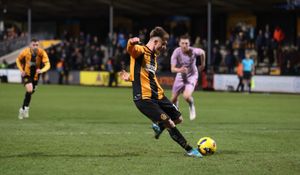 Ben Knight scores Cambridge United's winning penalty against Shrewsbury Town (Picture: Ben Phillips)