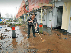 Supporting image for story: Water swamps road after pipe bursts