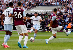 Aston Villa's John McGinn has a shot at goal 