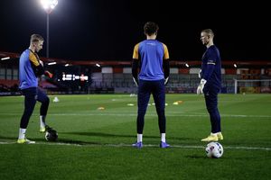 Joe Hart helping to warm up Matt Cox and Will Brook