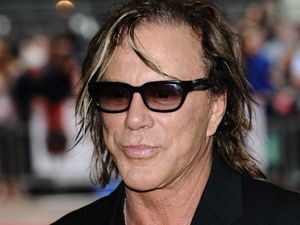 Close-up of Mickey Rourke wearing sunglasses