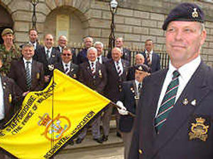 Supporting image for story: Farewell march for town's troops