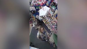 Video grab from CCTV footage showing a woman stealing £400 worth of Jellycat's by stuffing them down her trousers.