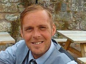 Supporting image for story: Oswestry binman was found lying on bed, inquest told